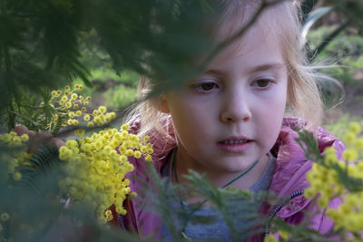 Portrait of girl with plants