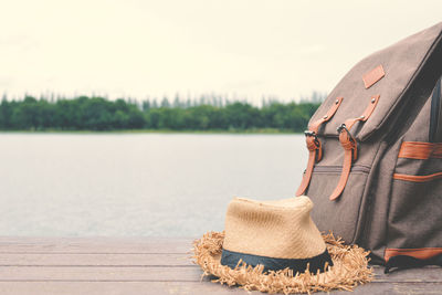 Close-up of backpack and hat