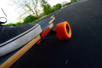 Close-up of car on road