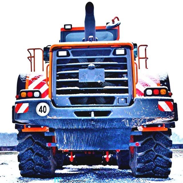 transportation, mode of transport, land vehicle, travel, men, nautical vessel, day, car, clear sky, train - vehicle, public transportation, outdoors, journey, red, stationary, on the move, incidental people, rail transportation, industry