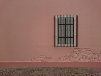 Close-up of window on brick wall