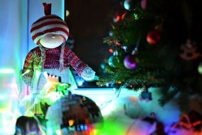 Close-up of christmas tree at night