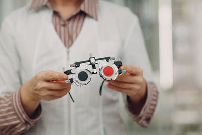 Midsection of man photographing