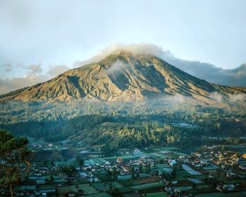 High angle view of volcanic mountain against sky