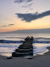 Scenic view of sea against sky during sunrise 