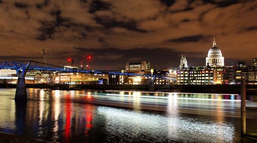 Reflection of illuminated buildings in water at night