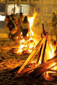 Close-up of illuminated bonfire at night