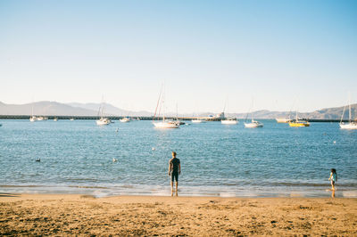 Woman fishing in sea