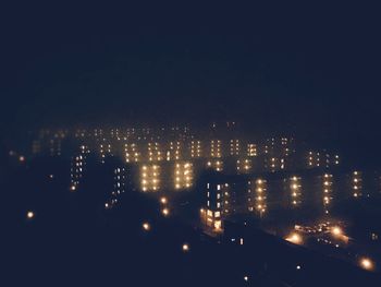 Illuminated cityscape at night