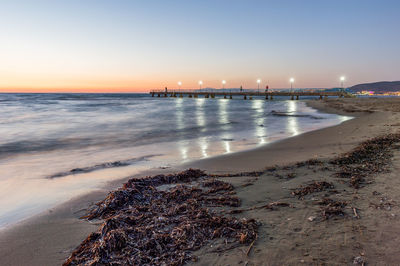Scenic view of sea at sunset
