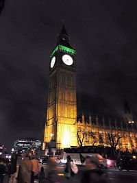 Low angle view of big ben against sky at night