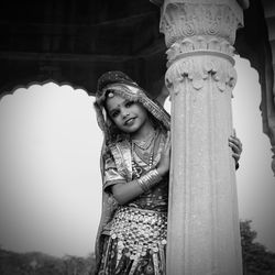 Portrait of girl standing outdoors