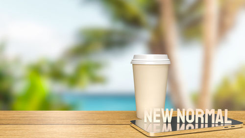 Close-up of coffee cup on table