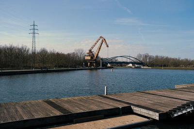 Bridge over river against sky