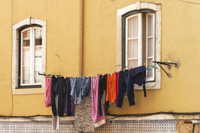 Clothes drying outside house