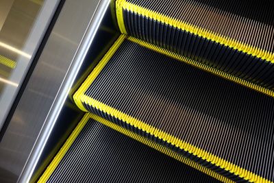 High angle view of illuminated escalator