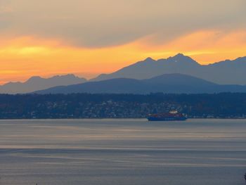 Scenic view of mountains against sky during sunset