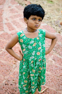 Portrait of boy standing outdoors