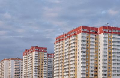 Low angle view of residential buildings against sky