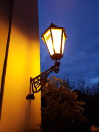 Low angle view of illuminated street light