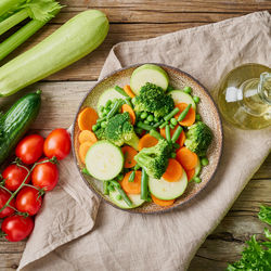 High angle view of fruits and vegetables on cutting board