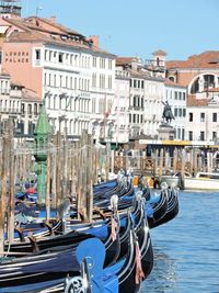 Boats moored in canal