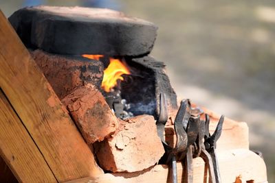 High angle view of fire on wood