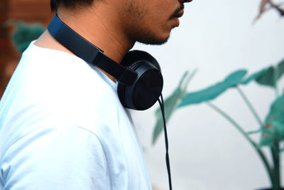 Close-up portrait of young man standing outdoors