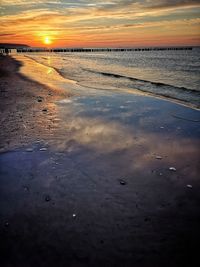 Scenic view of beach during sunset