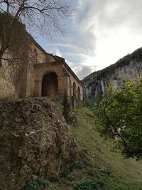 Low angle view of historic building against sky