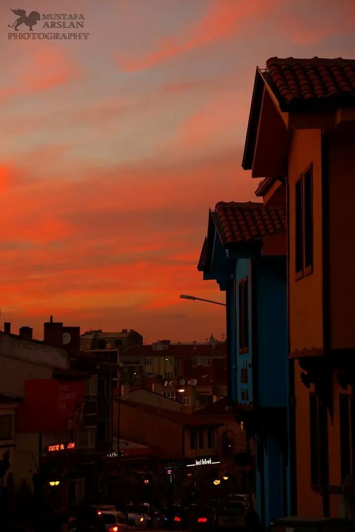 building exterior, architecture, built structure, sunset, orange color, sky, residential structure, city, residential building, house, cloud - sky, illuminated, residential district, building, dusk, outdoors, no people, cityscape, silhouette, cloud