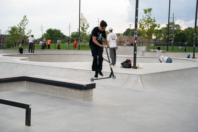 Full length of man skateboarding on skateboard