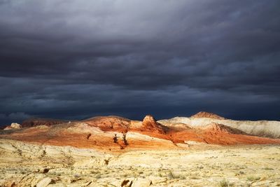 Scenic view of mountain against cloudy sky