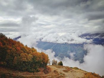 Scenic view of landscape against sky during autumn