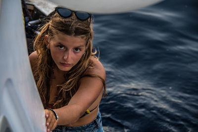 Portrait of girl in boat in sea