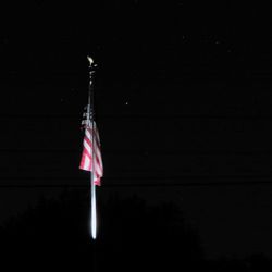 Illuminated flag at night