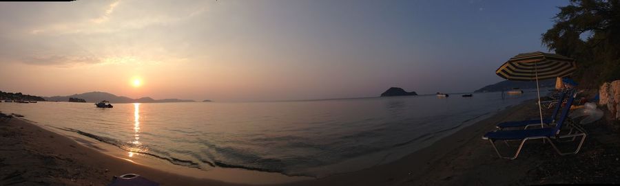 Panoramic view of sea against sky during sunset