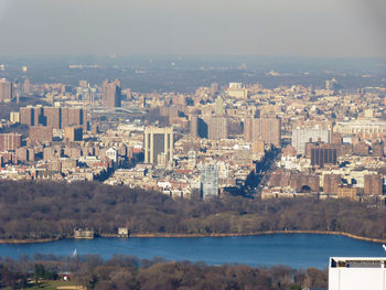 High angle view of river amidst buildings in city