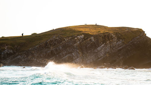 Scenic view of sea against clear sky