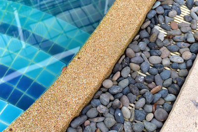 High angle view of stones in swimming pool