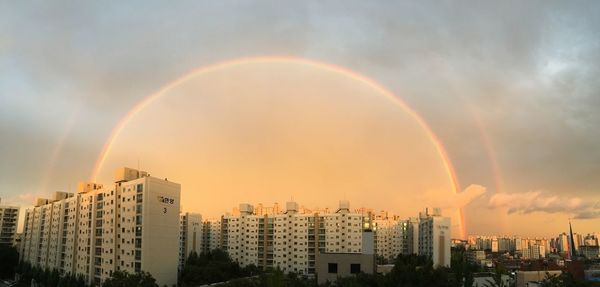 Rainbow over city