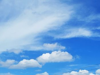 Low angle view of clouds in blue sky