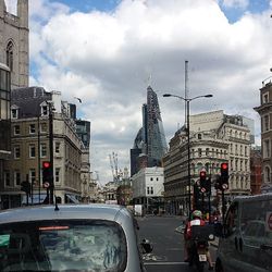 City street against cloudy sky