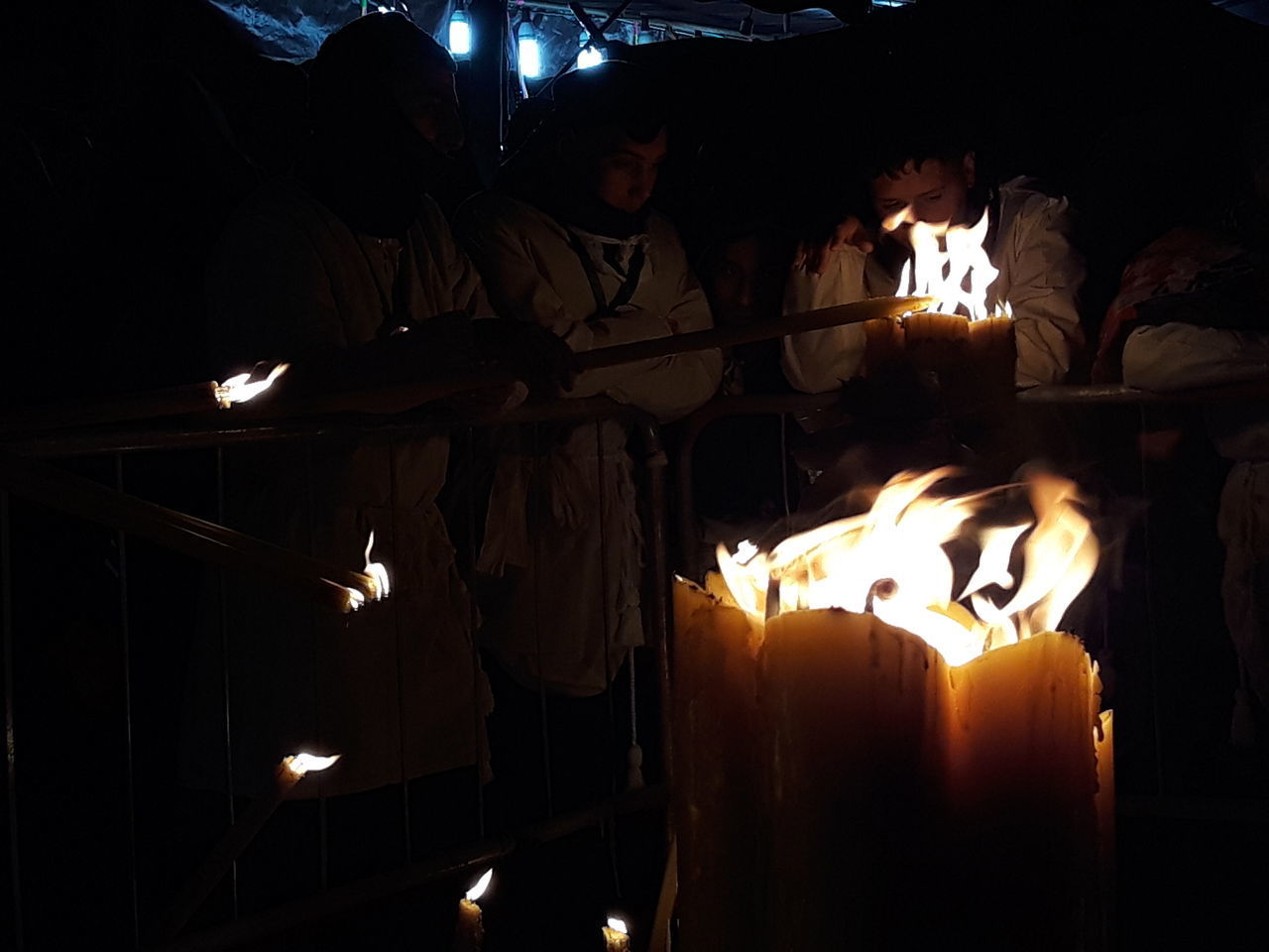 GROUP OF PEOPLE AT NIGHT