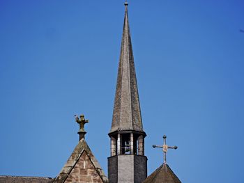 Low angle view of temple against clear blue sky