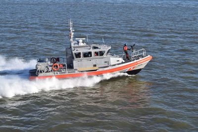 Boats sailing in sea