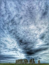 Low angle view of storm clouds over dramatic sky