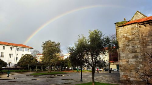 Rainbow over buildings