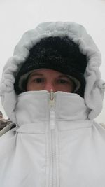 Portrait of man with snow covered face