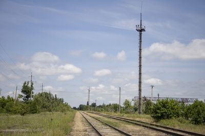 Railroad tracks against sky